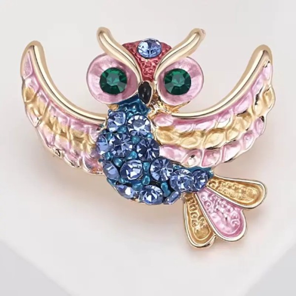 bijou hibou bleu oriole