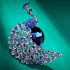 bijou doxa en forme de paon bleu