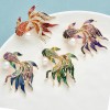 broche bijoux gilda en forme de poisson avec perle