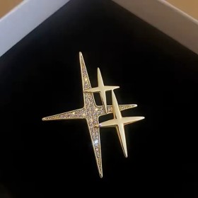 broche dorée étoile polaris avec strass