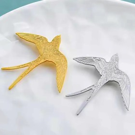 broche arven en forme d'oiseau