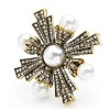broche vintage helios en forme de croix