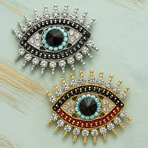 broche oeil strass nazar argenté et doré