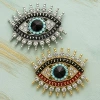 broche oeil strass nazar argenté et doré