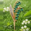 broche mariage fleur esmeralda strass