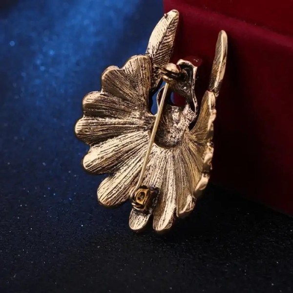 broche bijoux vêtement orakan