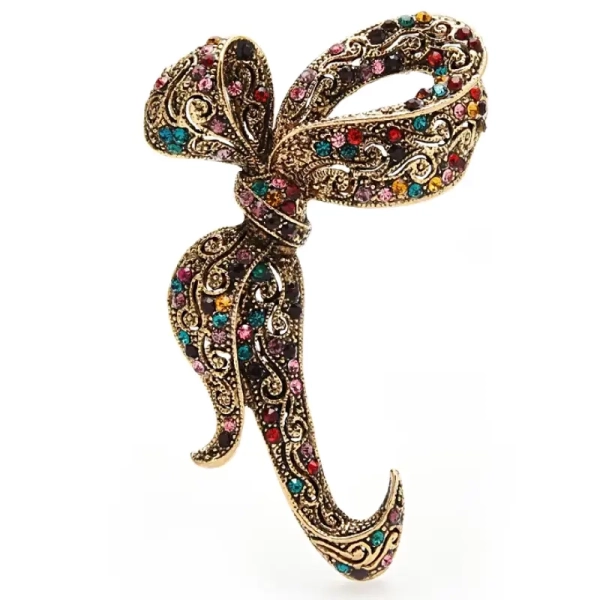 Broche vintage forme nœud baroque en métal bronze ajouré avec cristaux multicolores modèle Tatiana
